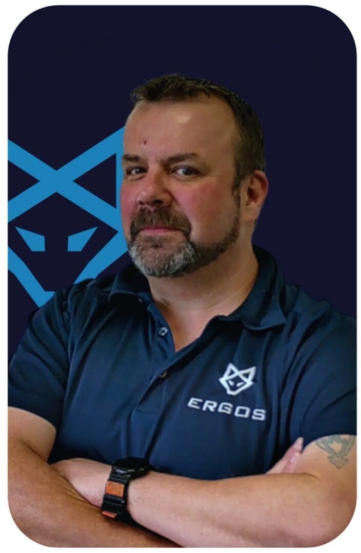 Man in ERSOS polo with arms crossed