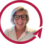 Smiling woman with glasses inside red circular arrow